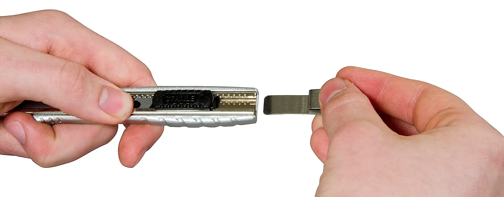 STANLEY 0-10-411 utility knife with blade replacement shown in hand close-up, photography