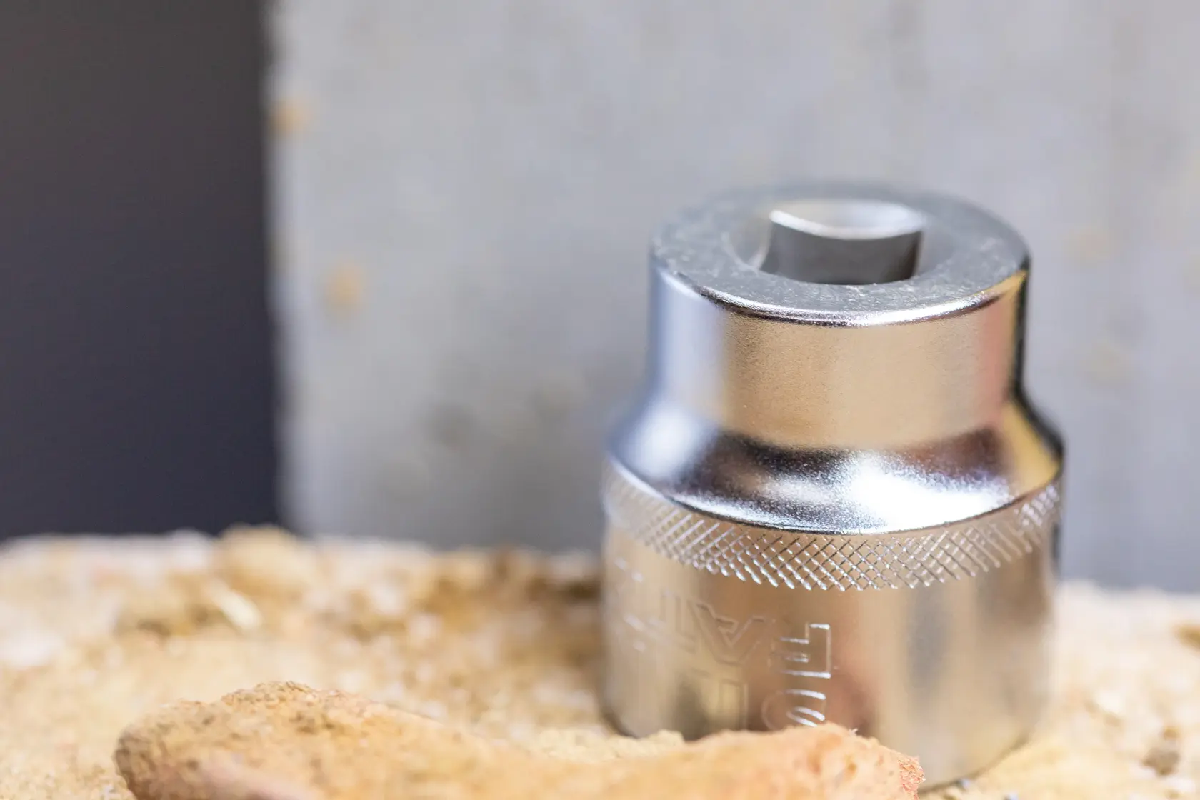 Photo of STANLEY FMMT17190-0 chrome socket, tool accessory with knurled grip, close-up view.