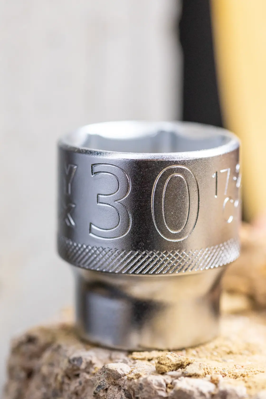 STANLEY FMMT17240-0 socket, silver, photography of 30mm hand tool from front on textured surface.