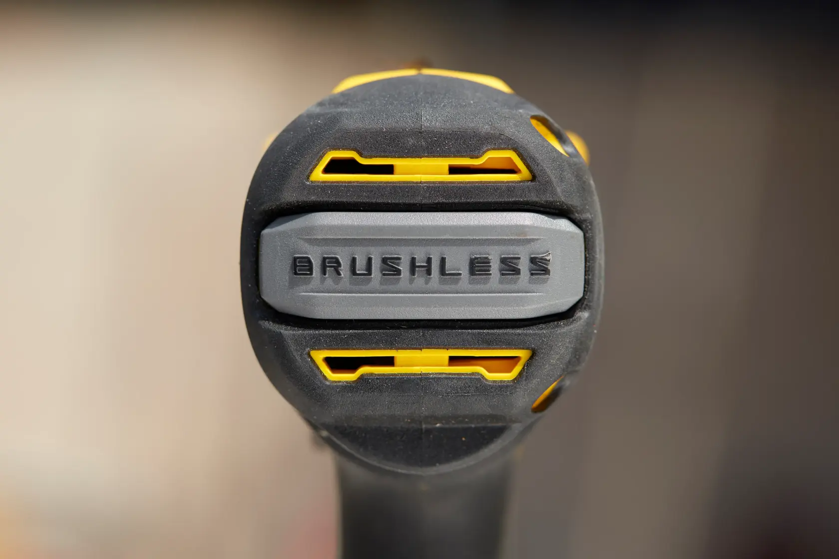 STANLEY SFMCD710D2K power tool close-up showing brushless motor end, yellow and black details.