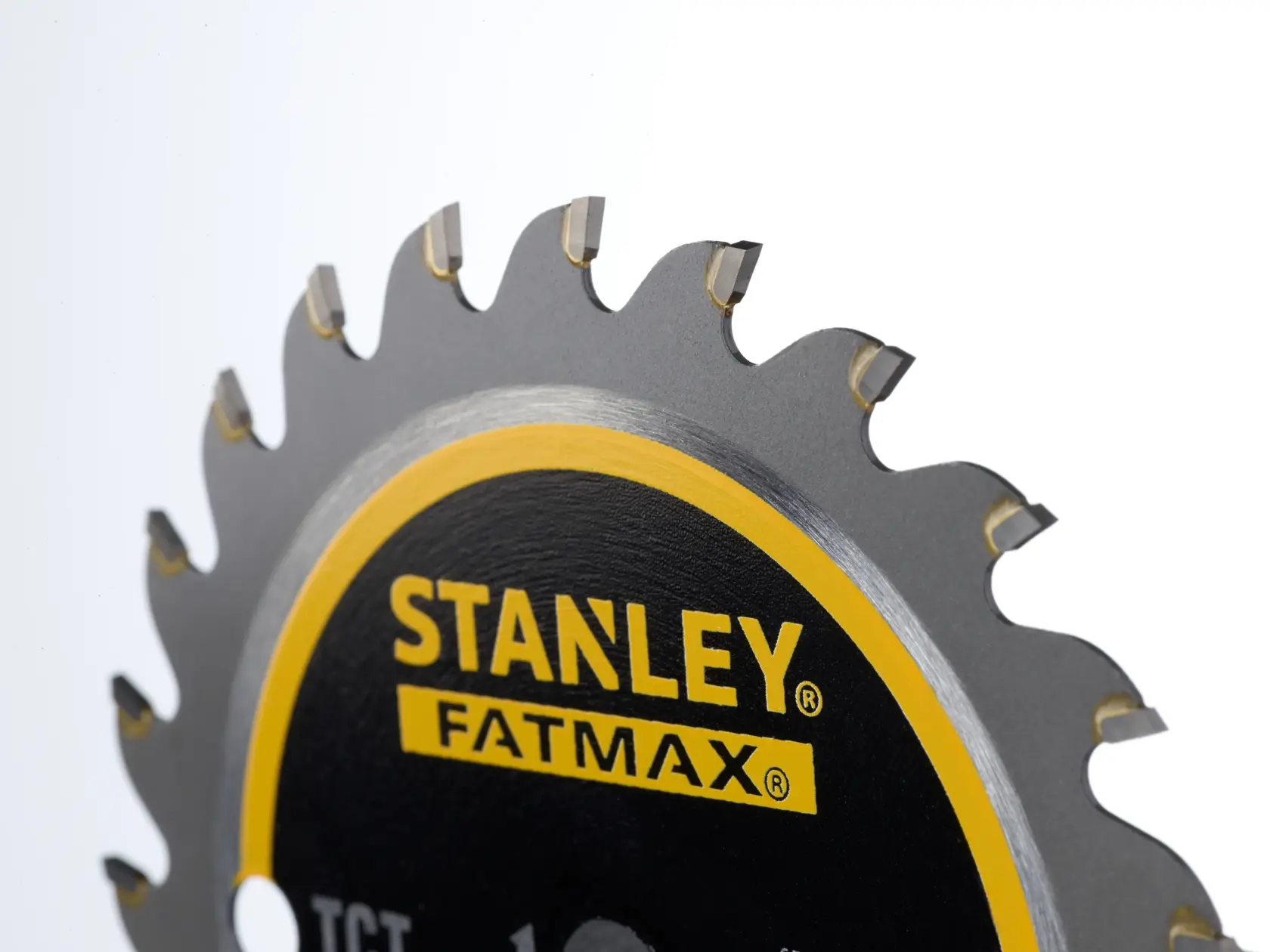 STANLEY STA10410 circular saw blade close-up, black and yellow design, side angle.