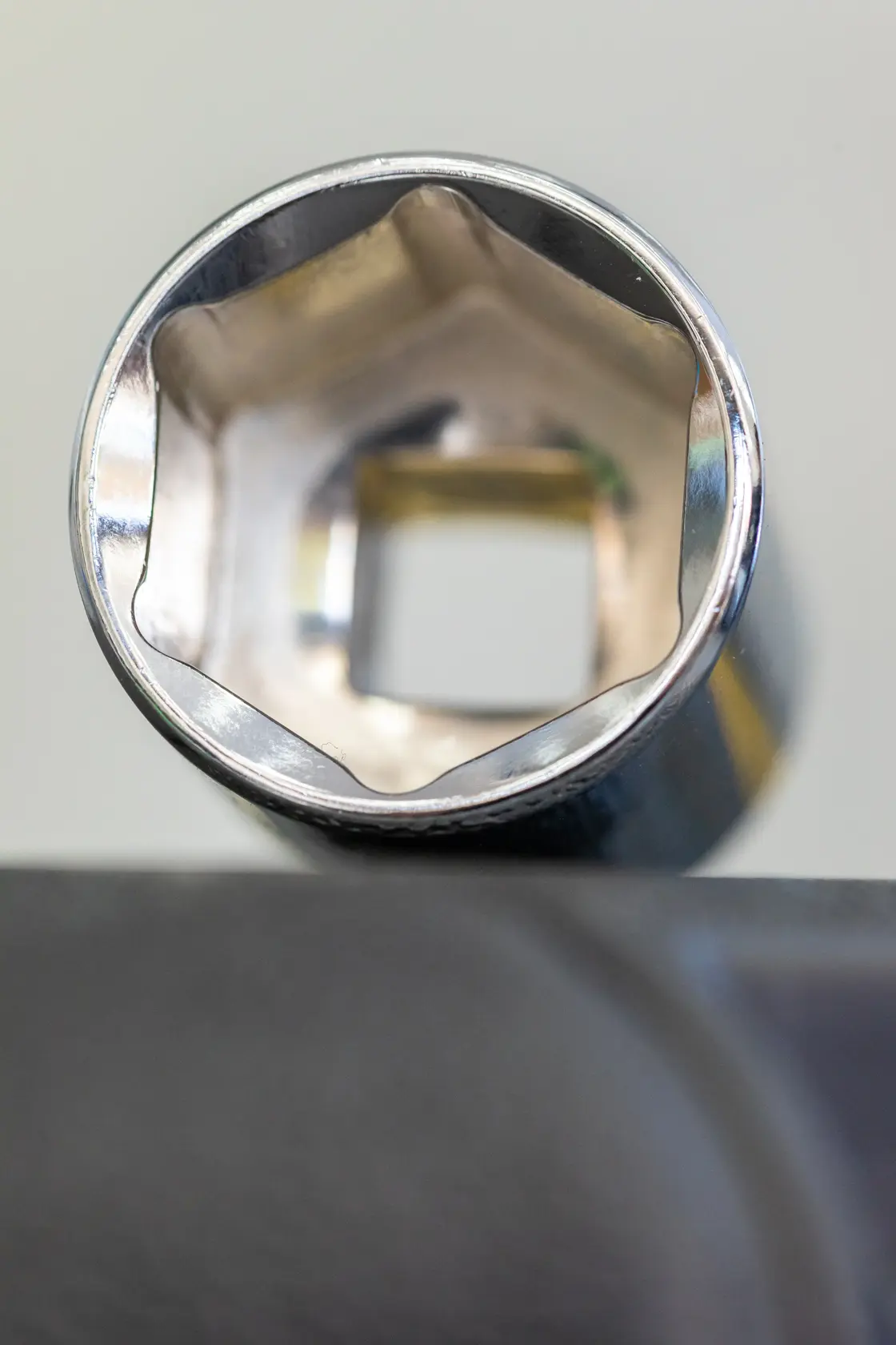 STANLEY STMT86307-0 chrome socket close-up, photography showing hexagonal interior and square drive opening.